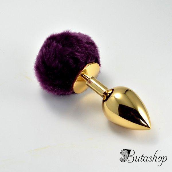Золотая анальная игрушка с фиолетовым помпоном - butashop.com